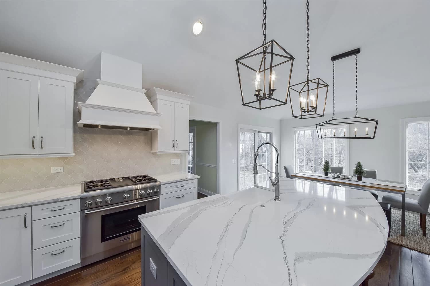Craftsman kitchen with warm wood cabinetry and natural stone