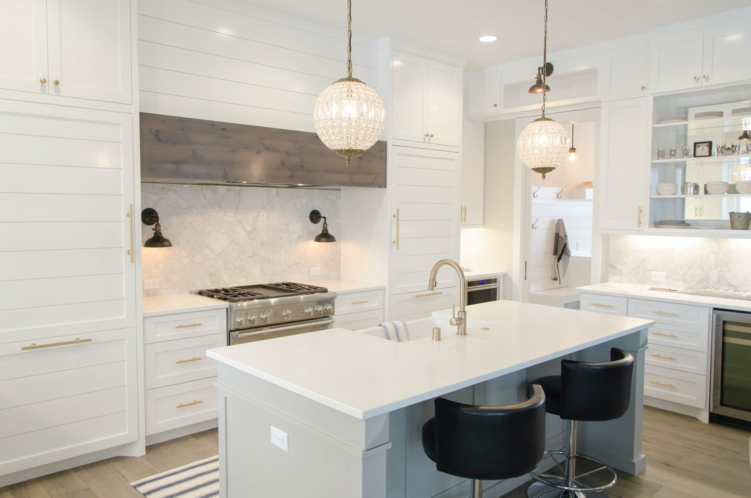 Luxury kitchen with marble backsplash by Giant Builders